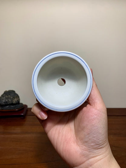 Blue-And-White Landscape Decoration, Outer Rim, Lower Band, Round Pot by Taru Genkō