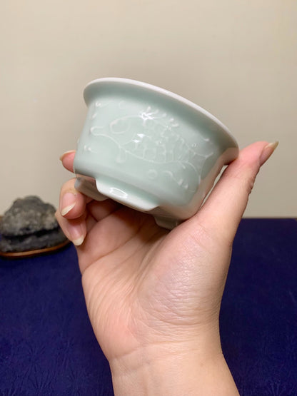 Ito Tuniyo Blue-Green Glazed Relief-Carved Fish-Playing Pot