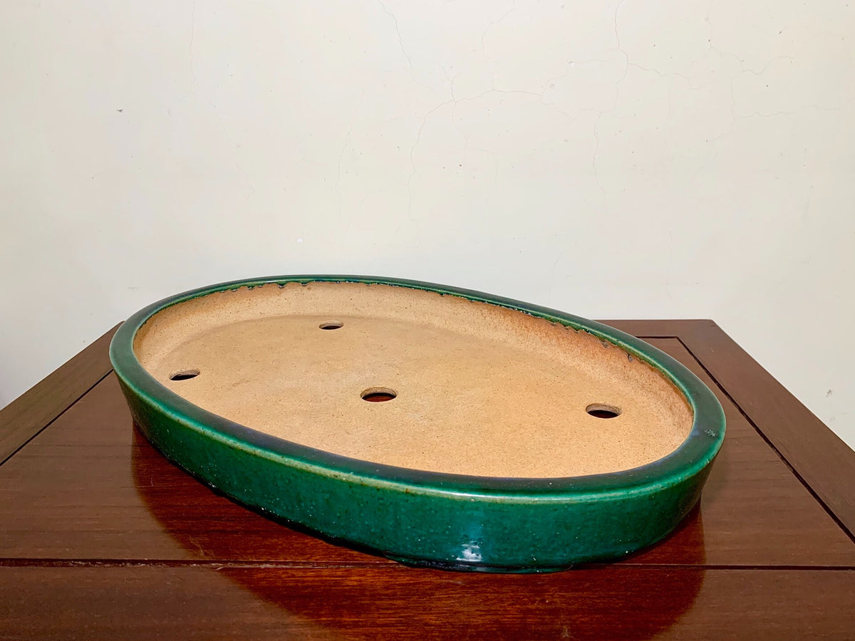 Sen Dai Kōyō Green Glaze Cut-Footed Oval Japanese Pot
