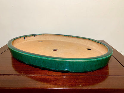 Sen Dai Kōyō Green Glaze Cut-Footed Oval Japanese Pot