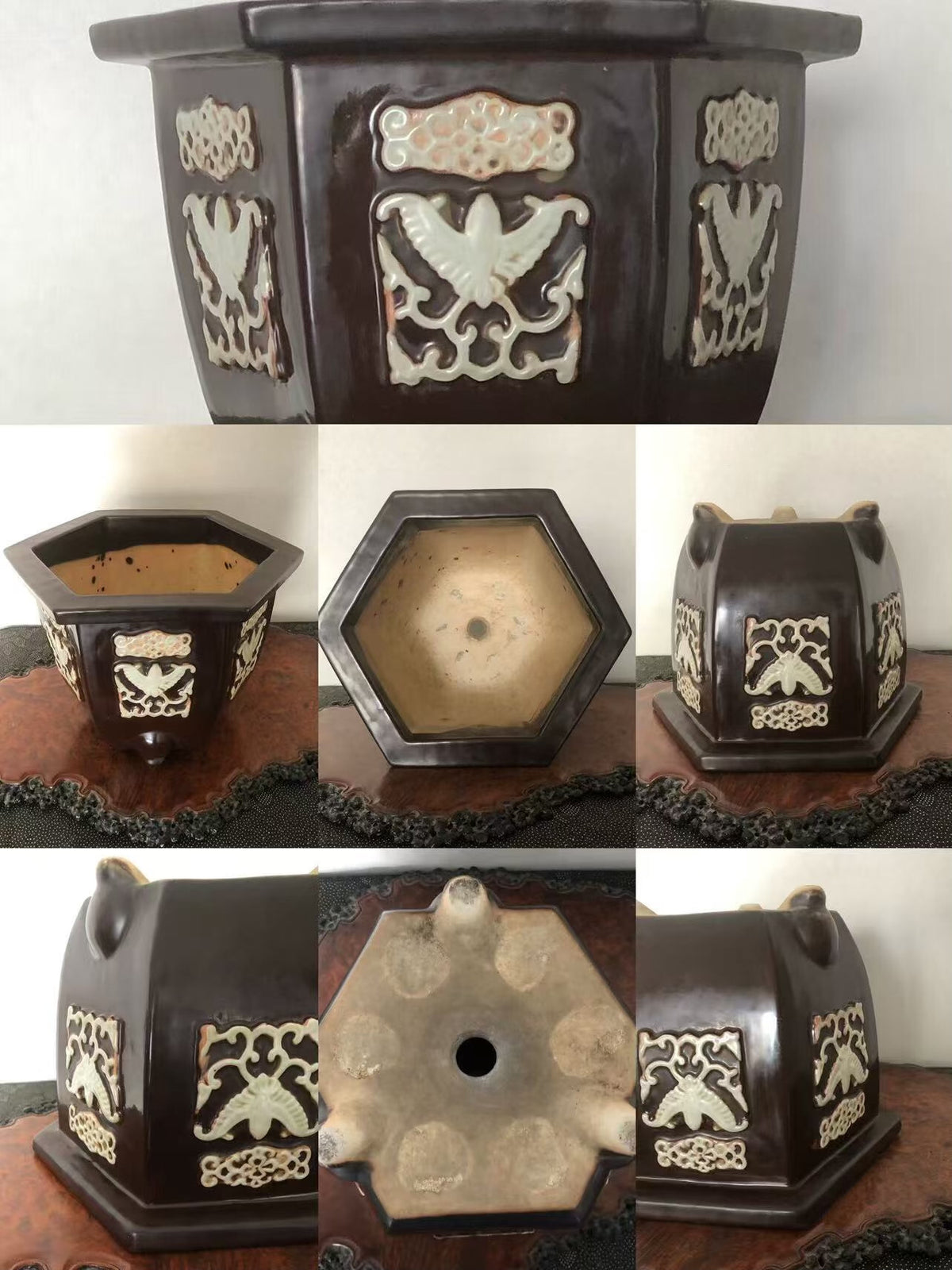 Dark brown hexagonal pot with cream-colored bird and floral relief decorations.