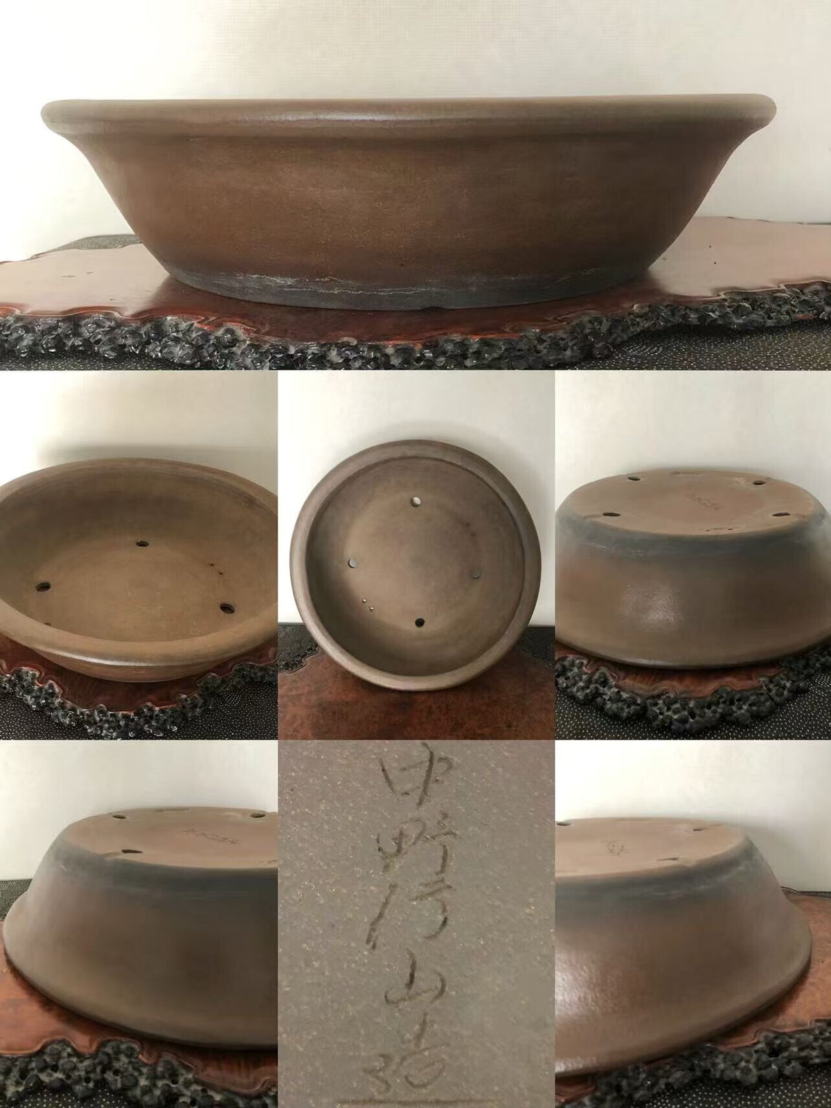 A brown glazed ceramic bonsai pot with a wide rim and three drainage holes.