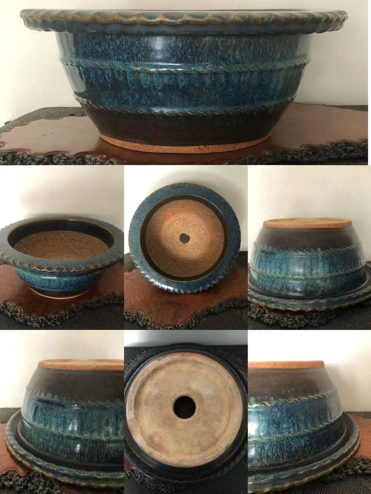 A glazed blue ceramic pot with a scalloped rim and textured surface.