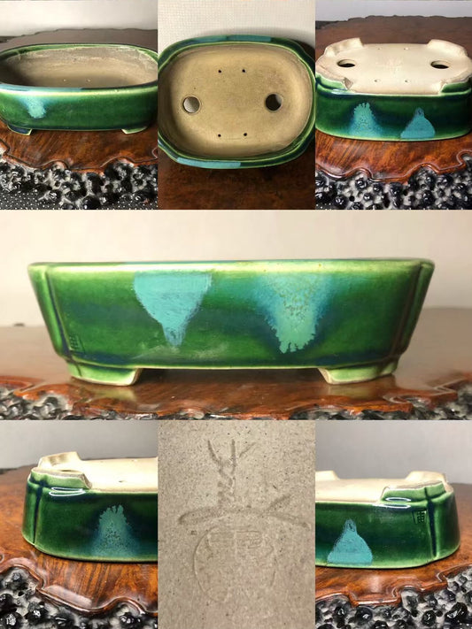 Rectangular green glazed pot with drip marks, unglazed base, and carved mark.