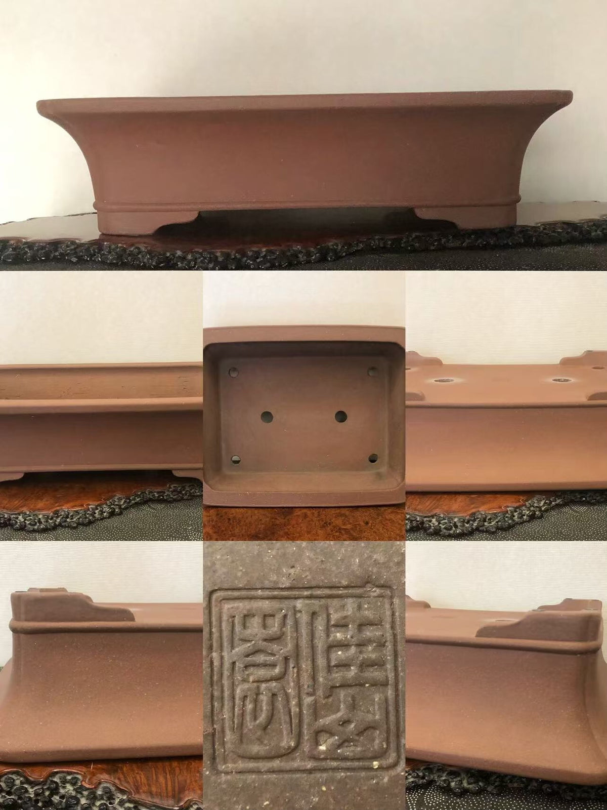 Rectangular terracotta bonsai pot with raised edges, unglazed matte finish, and carved square seal on base.