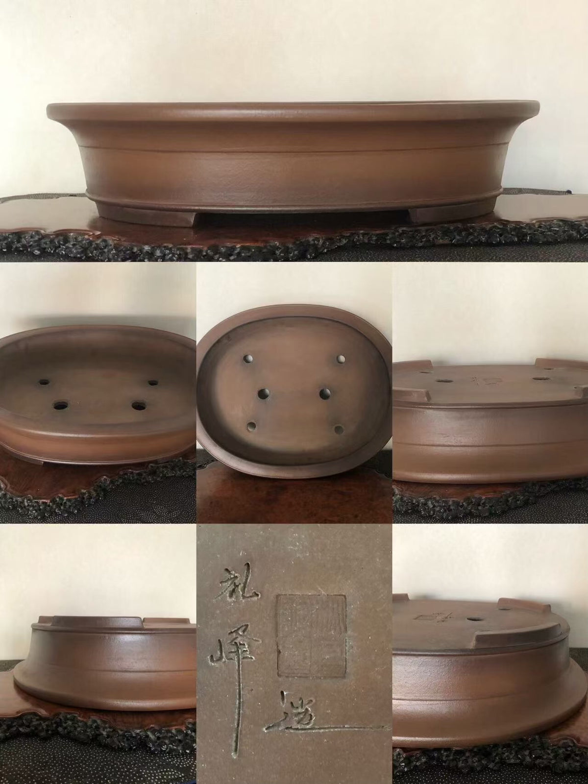 A brown, unglazed ceramic bonsai pot with a low, wide rim and four drainage holes.