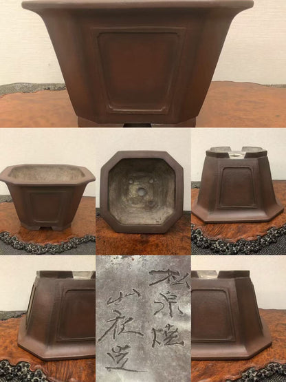 Dark brown octagonal ceramic pot with matte finish and incised characters on base.