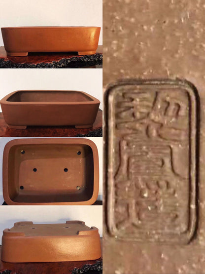 Rectangular terracotta bonsai pot with unglazed matte finish and carved maker's mark.