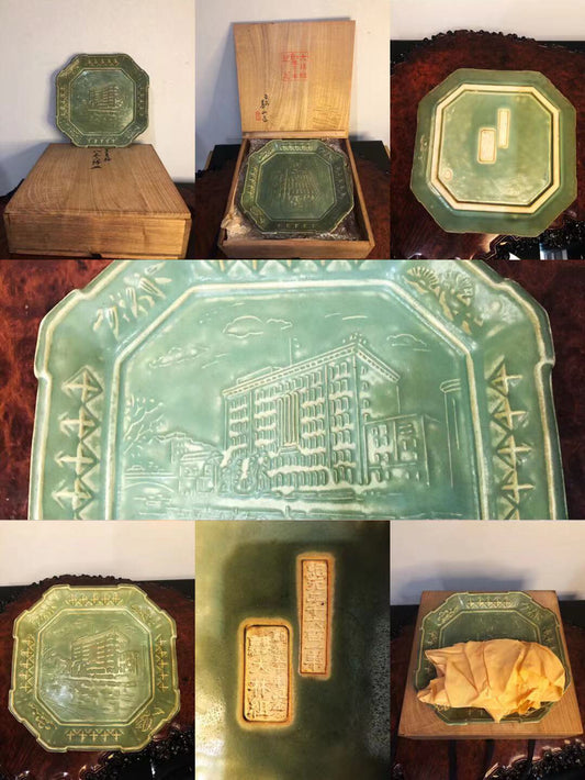 Six green glazed octagonal pots, each with raised building scenes and decorative borders.