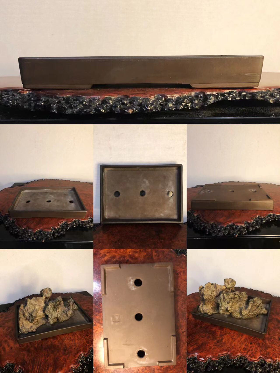A rectangular, matte, dark brown ceramic bonsai pot with three drainage holes and a rough, textured base.