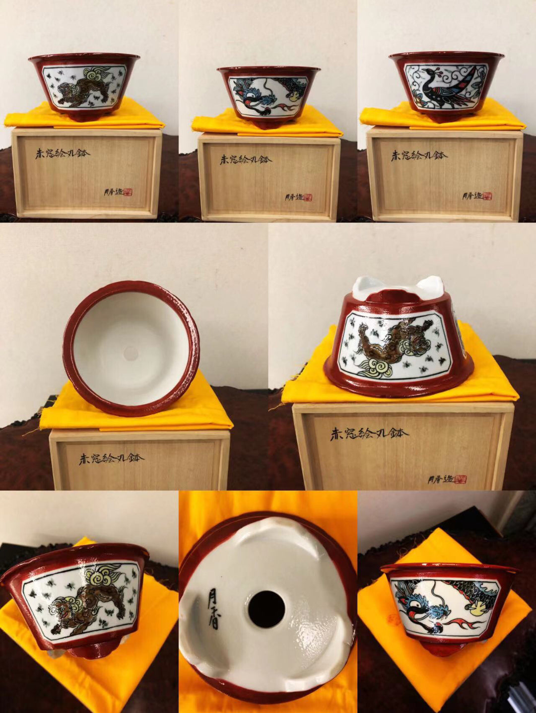 Three glazed ceramic pots with red rims, white interiors, and black dragon motifs on a yellow cloth.