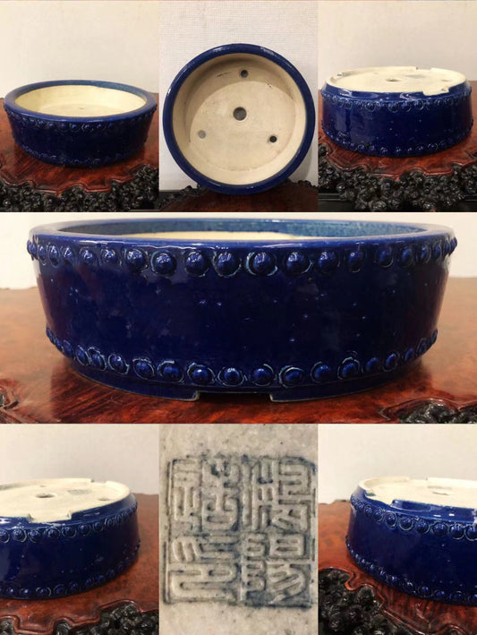 Deep blue glazed ceramic bonsai pot with raised dot pattern around rim and base.