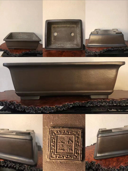 Dark brown rectangular pot with matte finish, showing base and decorative square seal.