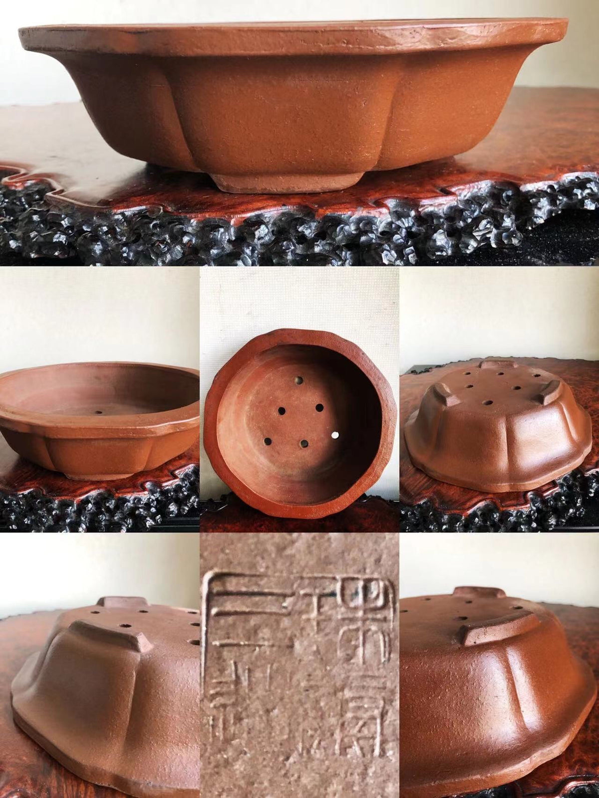 A terracotta bonsai pot with fluted sides, drainage holes, and an impressed maker’s mark.
