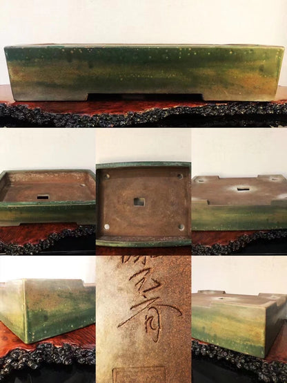 Rectangular glazed pot with green and brown mottled glaze, unglazed base with carved characters.