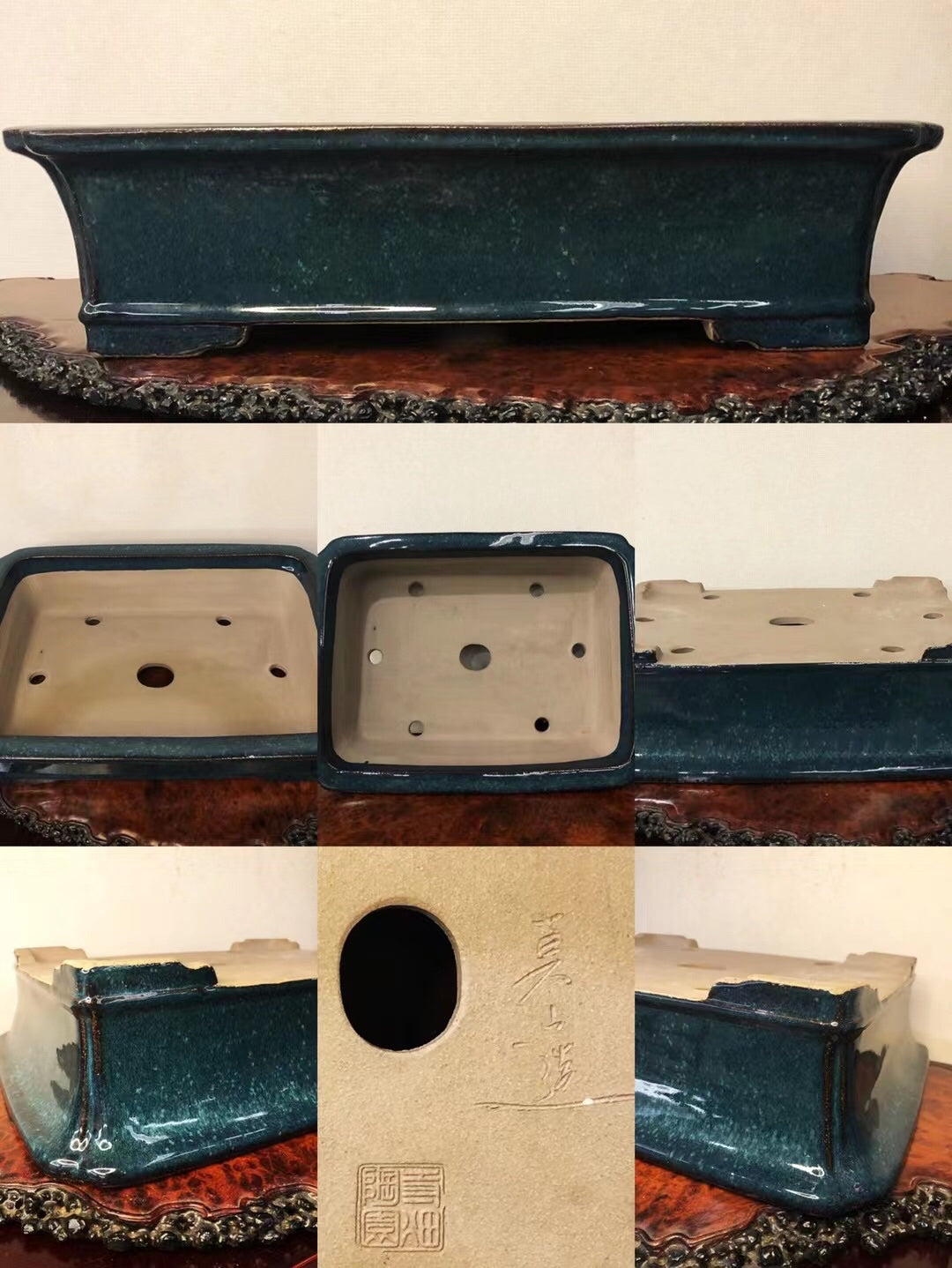Dark teal glazed rectangular pot with rounded corners, unglazed interior, and visible maker's mark.