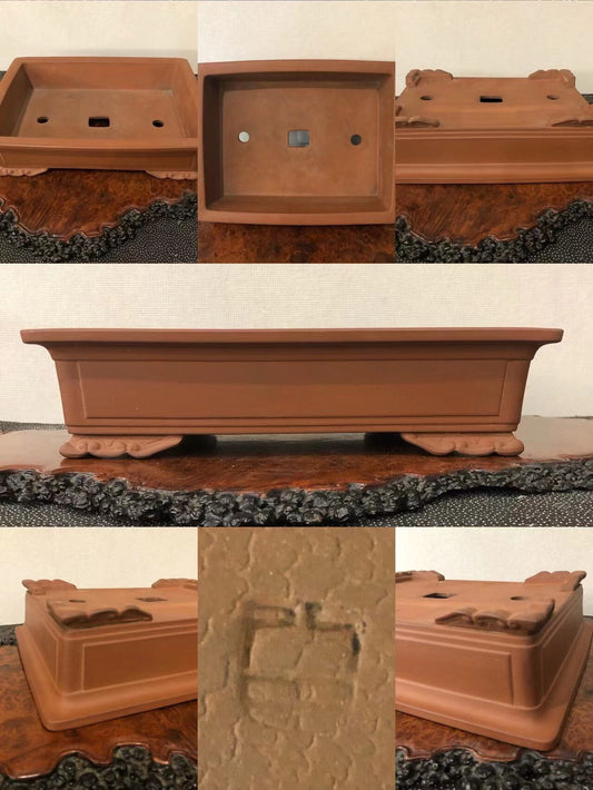 Rectangular terracotta bonsai pot with footed base, unglazed matte finish, and central square mark.