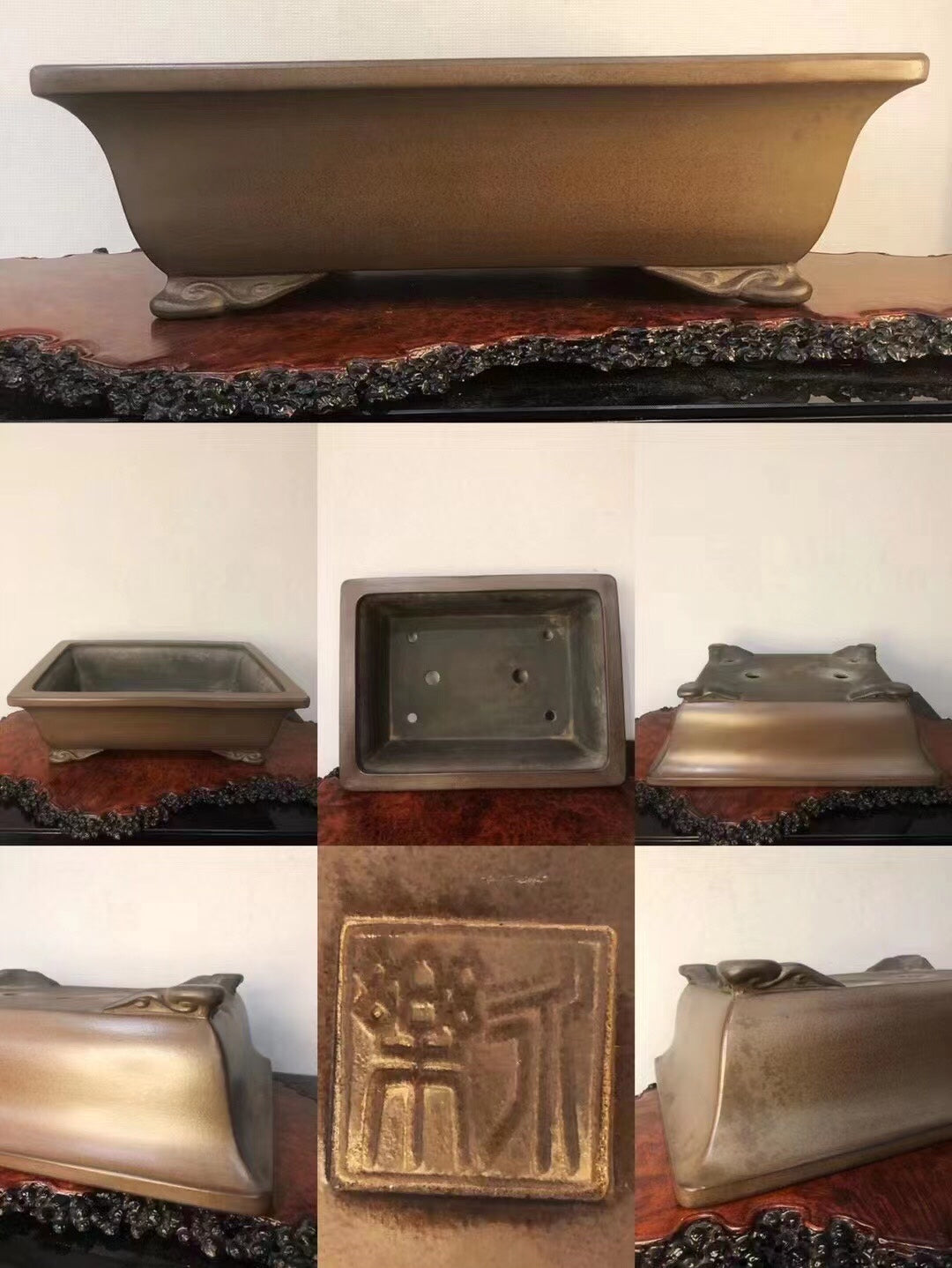 A rectangular bronze pot with a brushed finish, featuring a raised square seal on its side.