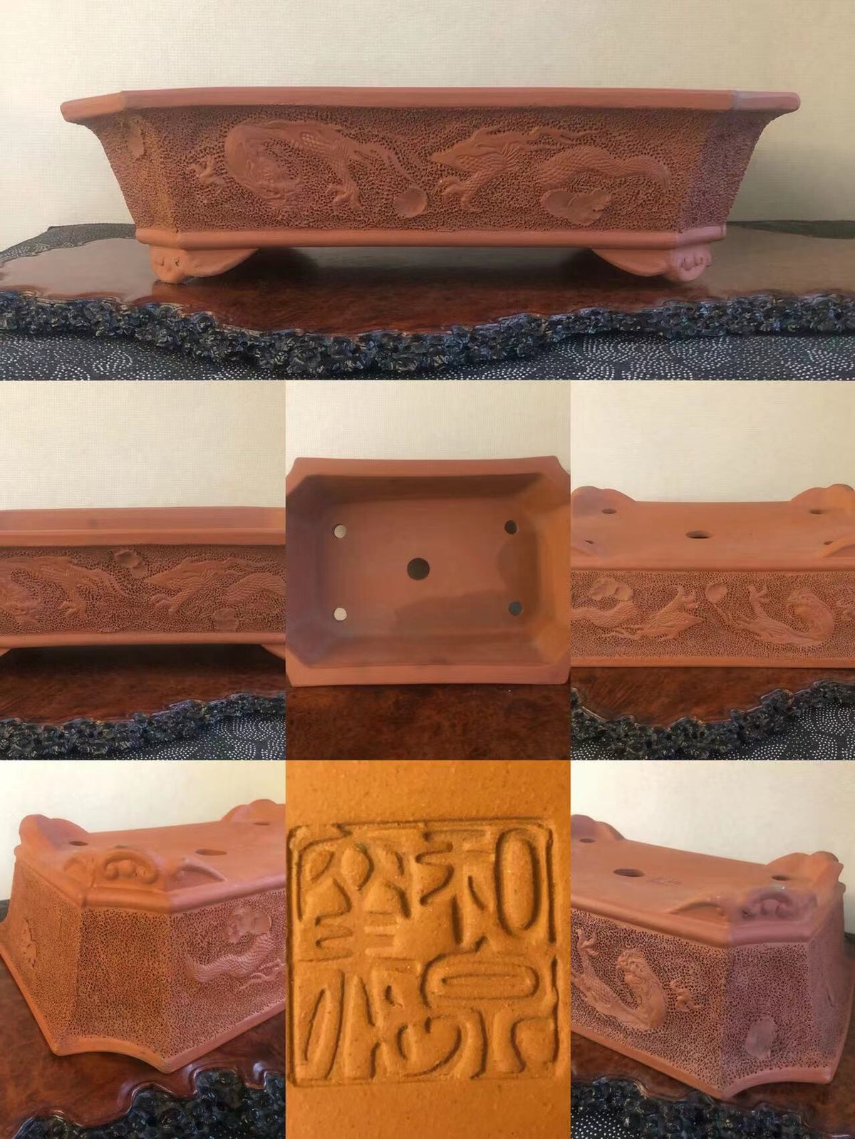 Rectangular terracotta pot with carved dragon motifs and a square base with a stamped seal.