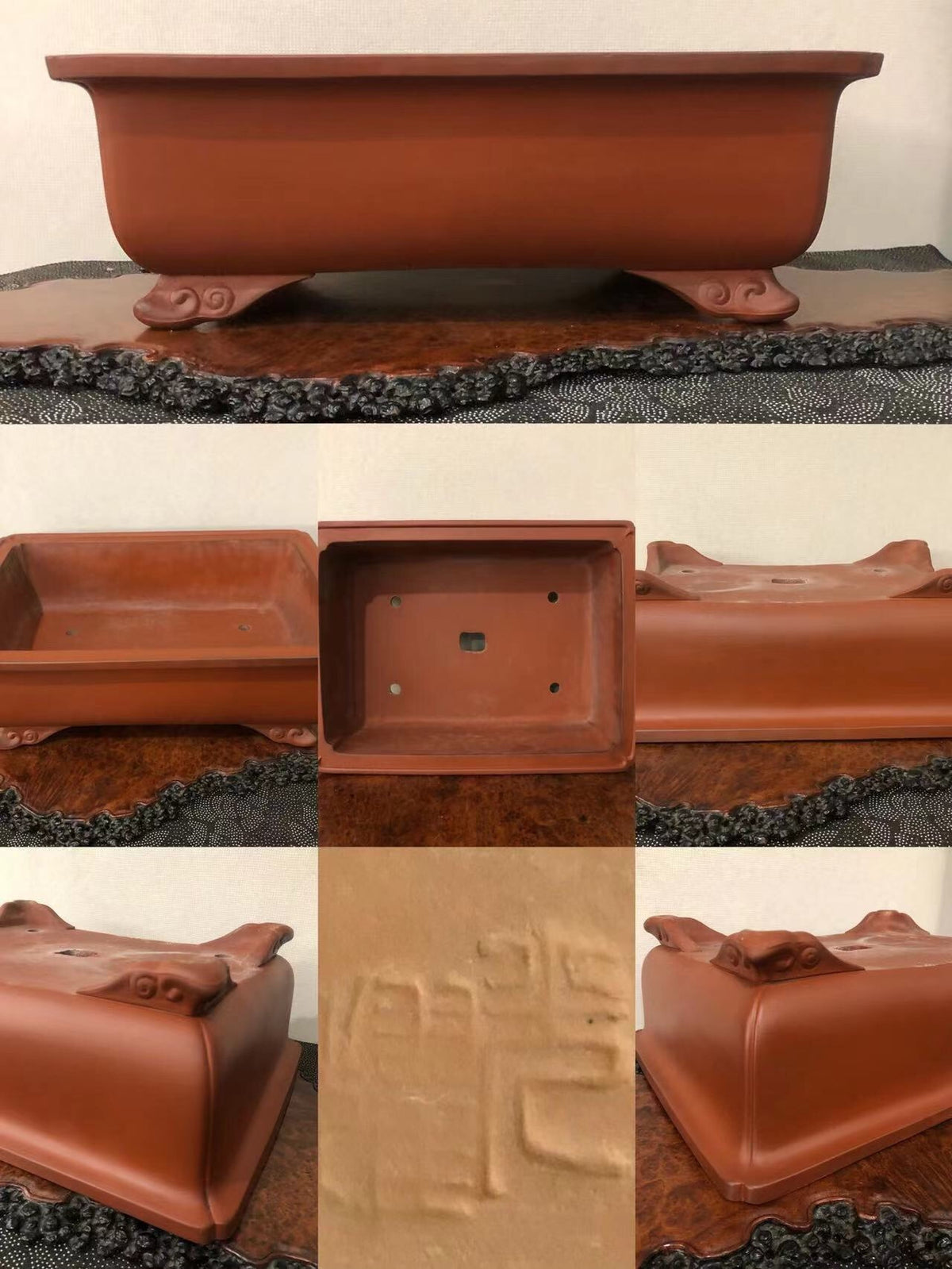 Rectangular terracotta pot with carved feet and impressed characters, matte finish.