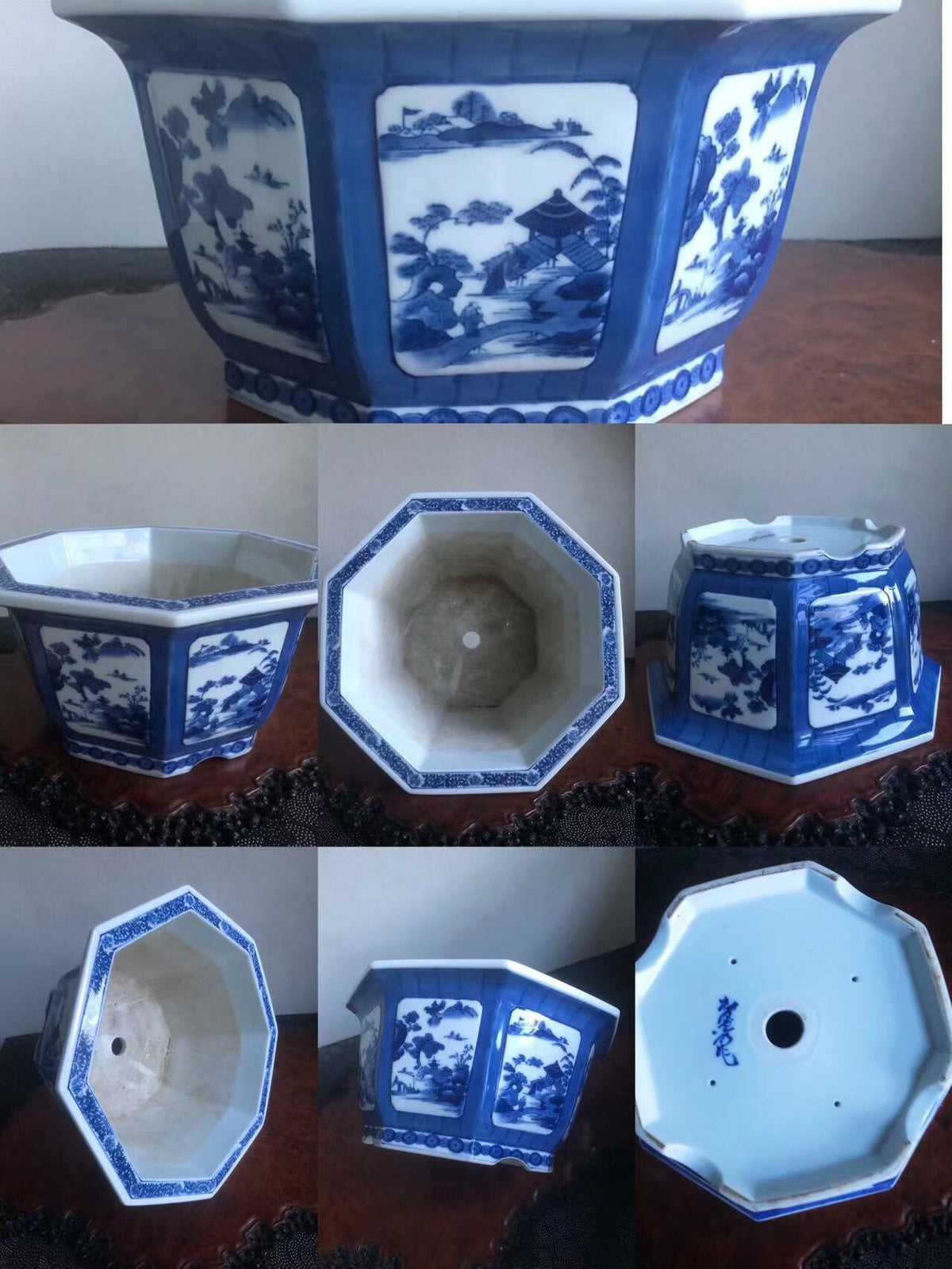 Octagonal blue and white ceramic pot with landscape scenes on panels, showing interior and base.