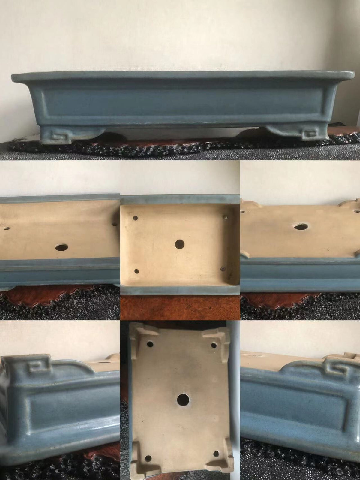 A rectangular blue glazed pot with a light beige interior and four feet.