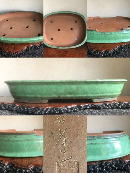 A green glazed rectangular bonsai pot with a brown unglazed interior and carved signature.
