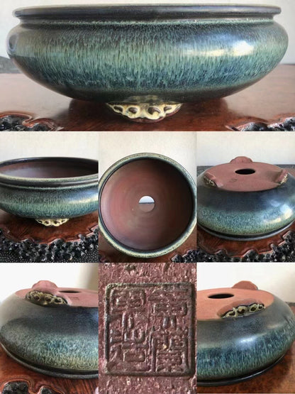 A glazed ceramic pot with a mottled green and blue glaze, a footed base, and a square seal impression.