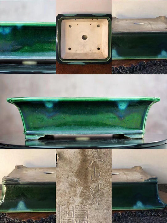 A rectangular glazed pot with a vibrant green glaze and subtle blue speckles, showing an engraved mark on its base.