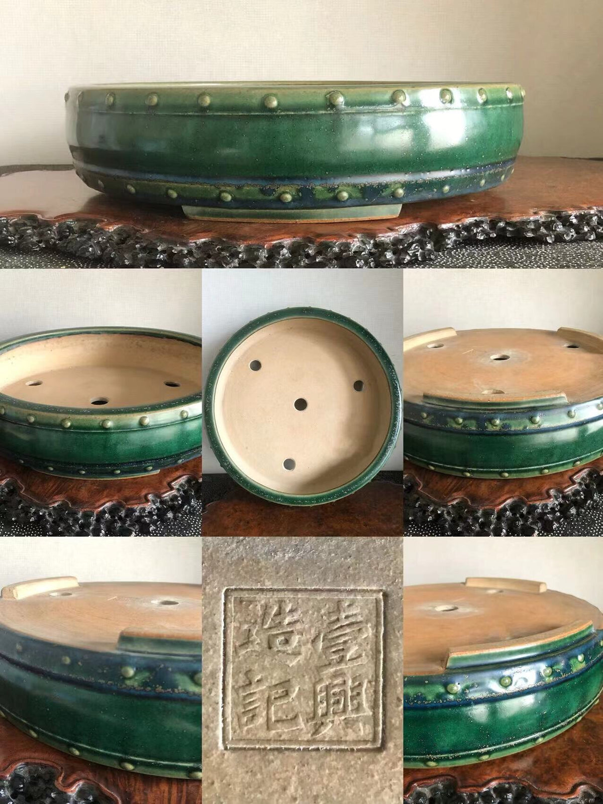 A green glazed ceramic bonsai pot with raised dots and a square stamped mark.