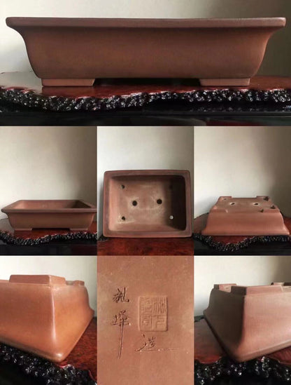 Rectangular terracotta bonsai pot with unglazed matte finish and carved maker's mark.