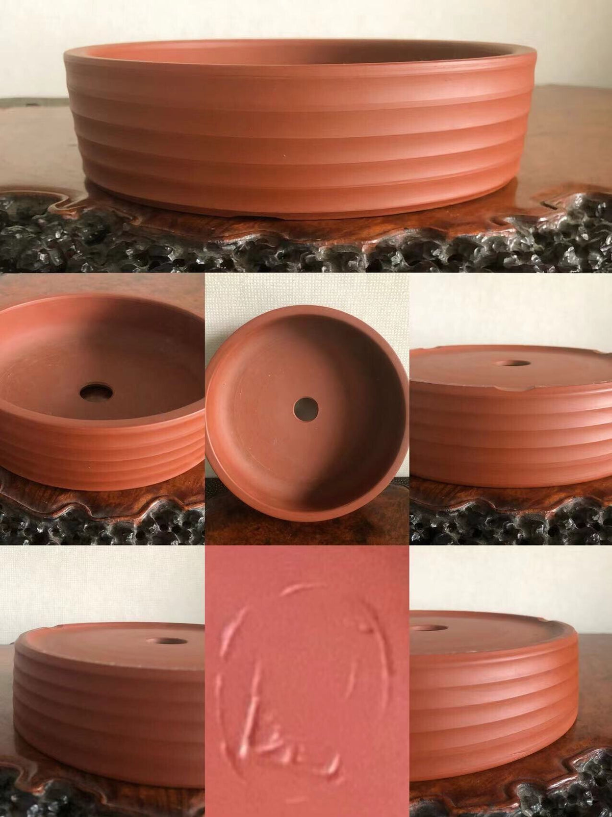 A terracotta bonsai pot with horizontal ridges and a central drainage hole.