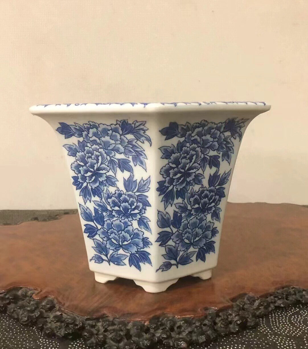 White ceramic pot with blue peony pattern, square shape, glossy finish.