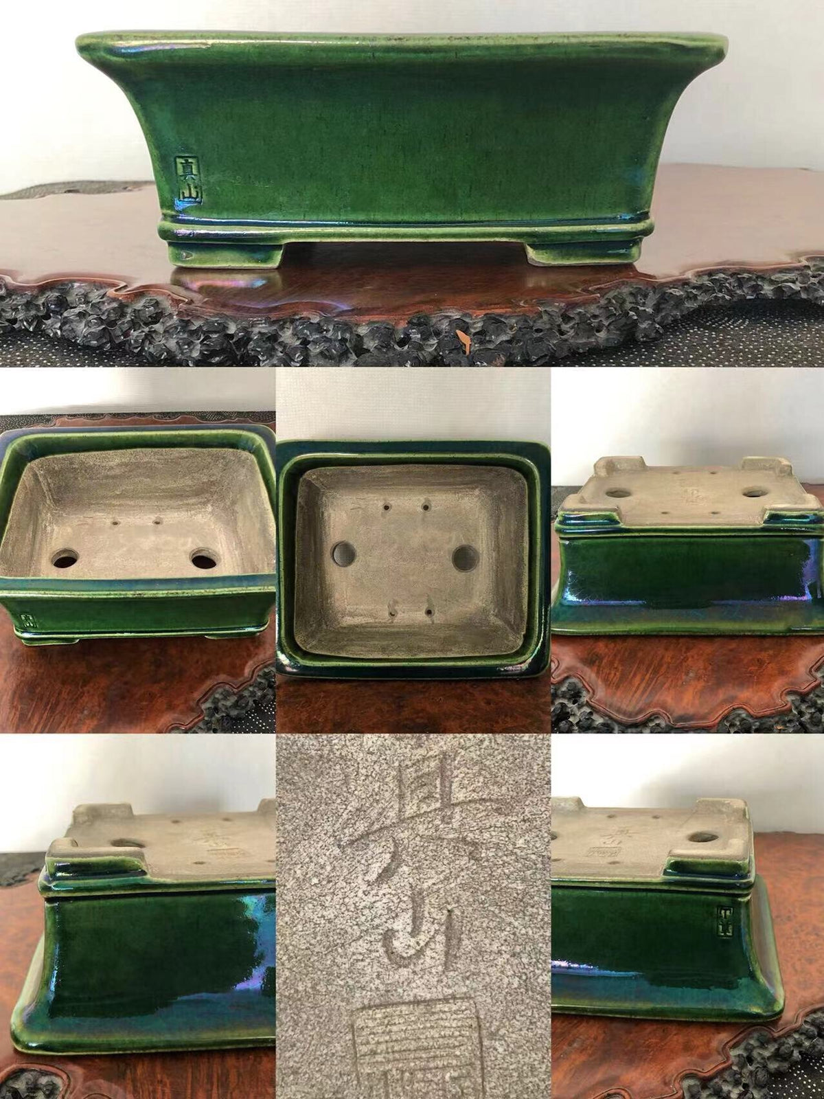 A glossy green rectangular ceramic pot with a carved signature and drainage holes.