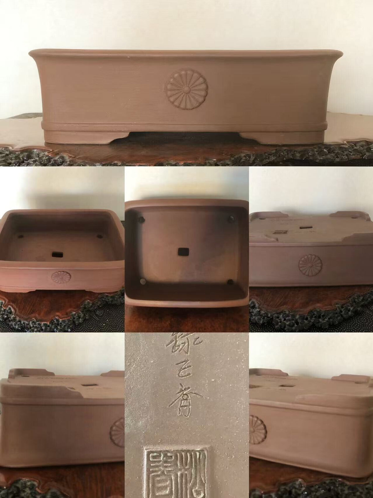 Rectangular terracotta bonsai pot with sunburst relief and carved signature on base.