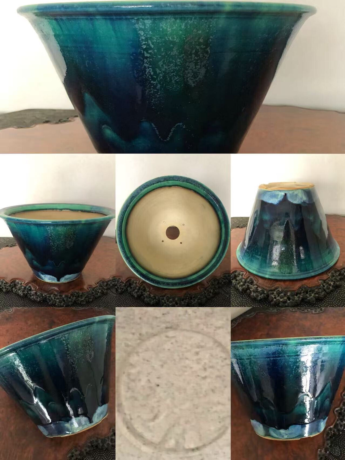 A glazed ceramic pot with a wide rim, deep blue-green glaze, and a beige interior.