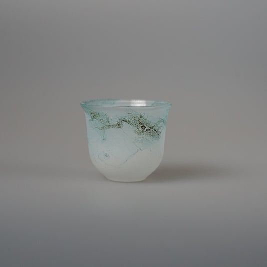Small frosted glass sake cup with a green crackled band running around its rim.